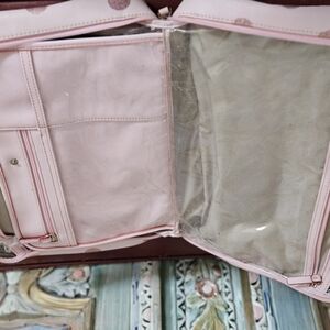 Kate Spade Pink Cosmetic Bag with Elegant Design